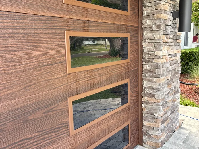 Freshly cleaned garage door glass on an upscale Tampa home