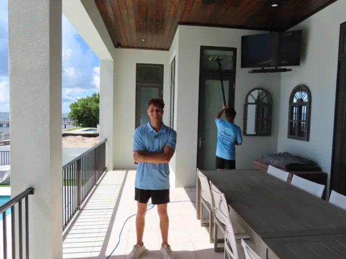 The Pelican Exteriors team working on a waterfront Tampa lanai