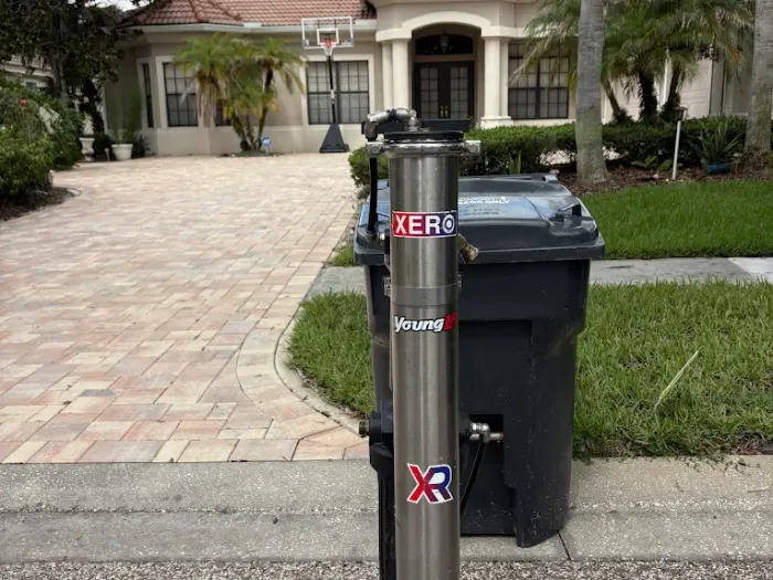 Pelican Exteriors reverse osmosis tank on the driveway of a Tampa home